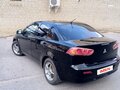 2008 Mitsubishi Lancer X, чёрный, 650000 рублей - вид 4