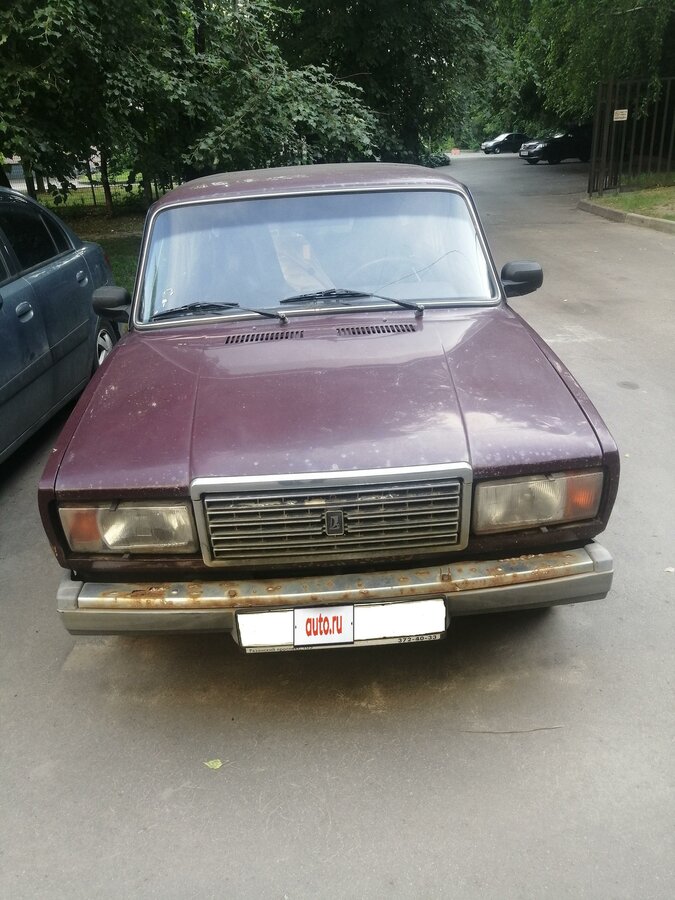 Фиолетовый лада седан