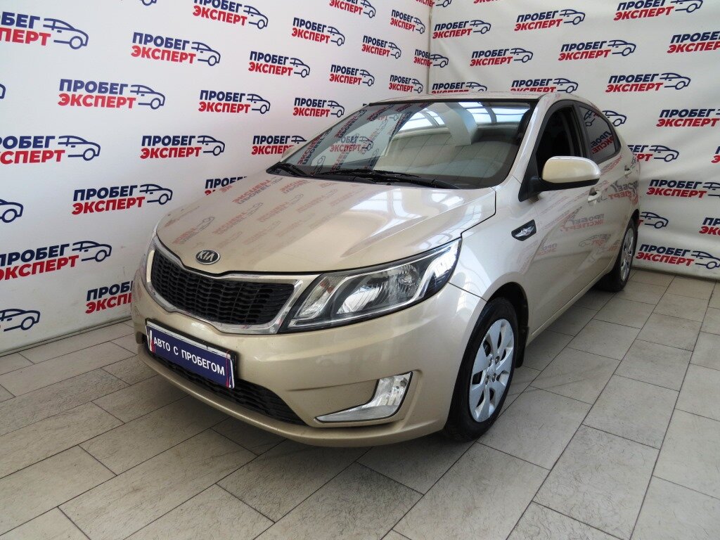 Kia Rio 2013 золотистый