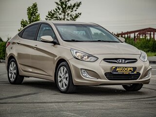 2012 Hyundai Solaris I, бежевый, 799000 рублей, вид 1