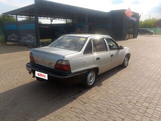 2002 Daewoo Nexia I, серый, 180000 рублей, вид 4