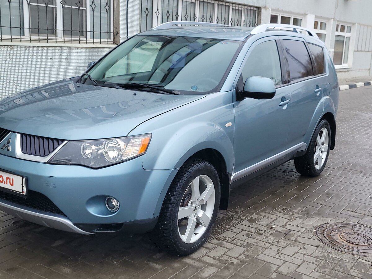 Купить б/у Mitsubishi Outlander II 2.4 CVT (170 л.с.) 4WD бензин вариатор в Тольятти: голубой ...