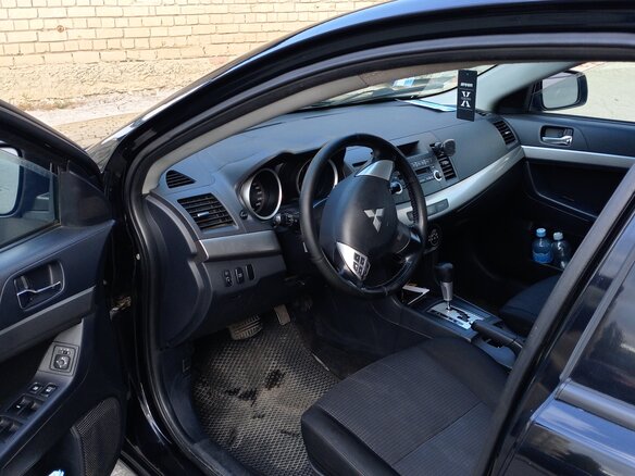 2008 Mitsubishi Lancer X, чёрный, 650000 рублей - вид 5