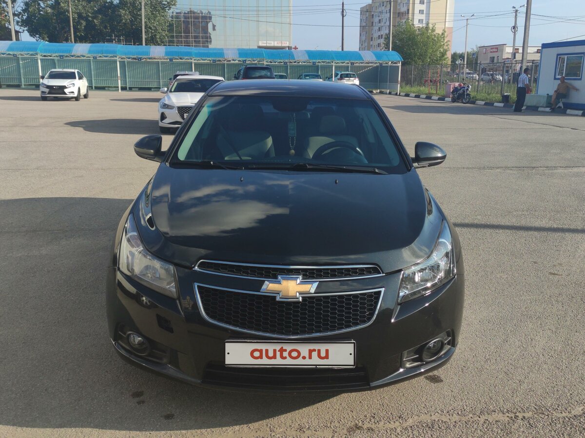 Купить б/у Chevrolet Cruze I 1.6 AT (109 л.с.) бензин