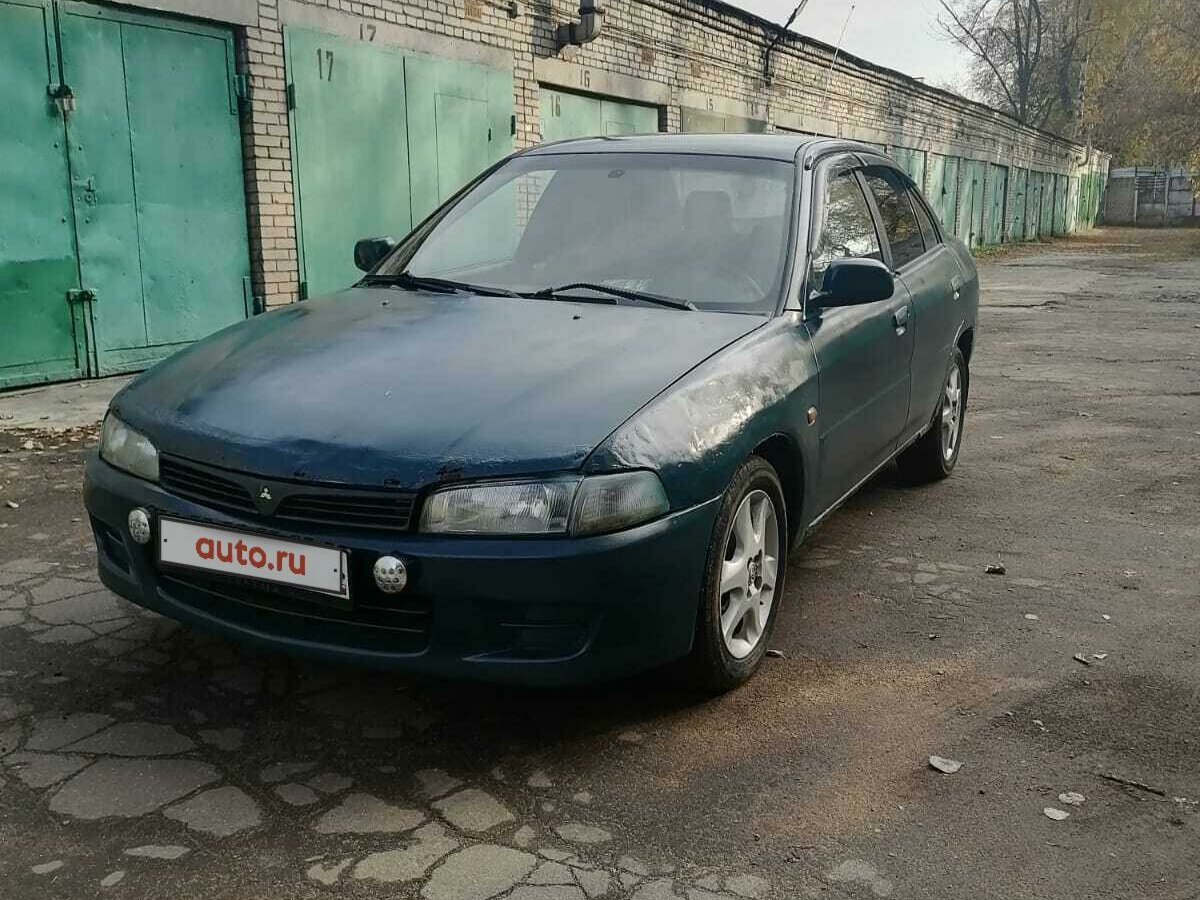 Зеленый митсубиси лансер