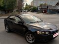 2008 Mitsubishi Lancer X, чёрный, 650000 рублей - вид 1