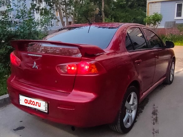 2007 Mitsubishi Lancer X, красный, 660000 рублей - вид 3