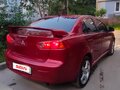 2007 Mitsubishi Lancer X, красный, 660000 рублей - вид 3