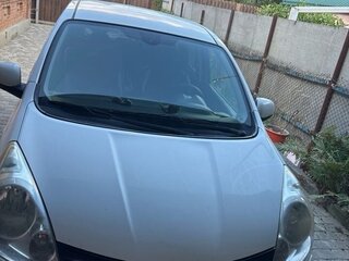 2012 Nissan Note I Рестайлинг, белый, 830000 рублей, вид 1