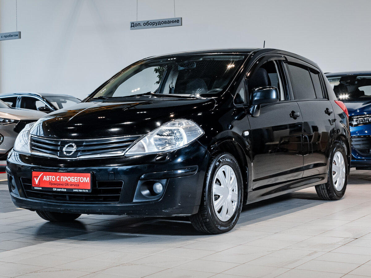 Nissan Tiida 2012 серебряный 1.6 л. л. 2WD автомат с пробегом 178 000 км Автомол