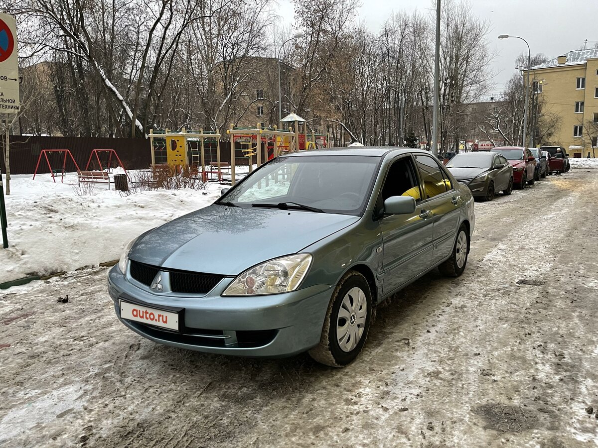 Митсубиси лансер голубой