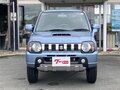 2010 Suzuki Jimny Kei car III Рестайлинг 1, голубой - вид 2