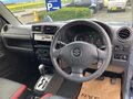 2010 Suzuki Jimny Kei car III Рестайлинг 1, голубой - вид 9