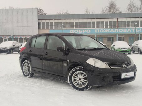 2011 Nissan Tiida I Рестайлинг, чёрный, 594000 рублей, вид 1