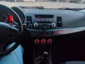 2007 Mitsubishi Lancer X, красный, 660000 рублей - вид 6