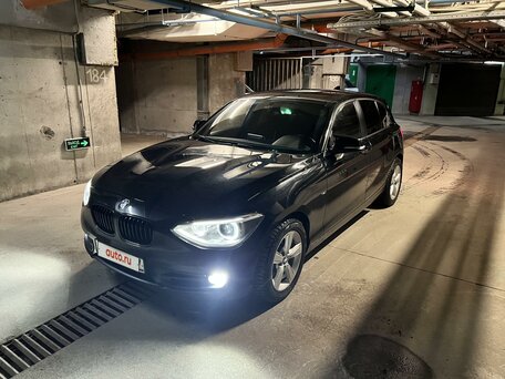 2014 BMW 1 серии 116i II (F20/F21), чёрный, вид 1