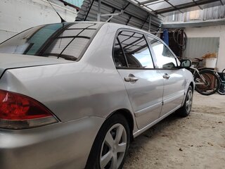 2005 Mitsubishi Lancer IX Рестайлинг, серебристый, 235000 рублей, вид 1