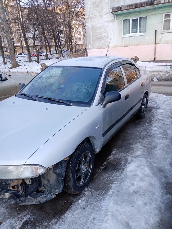 Митсубиси каризма лифтбек