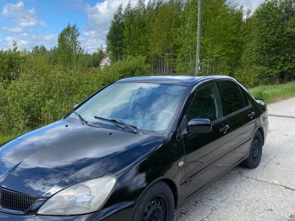 Купить б/у Mitsubishi Lancer IX Рестайлинг 1.6 AT (98 л.с.) бензин ...