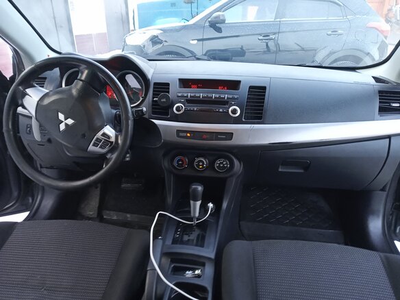 2008 Mitsubishi Lancer X, серый, 560000 рублей - вид 4