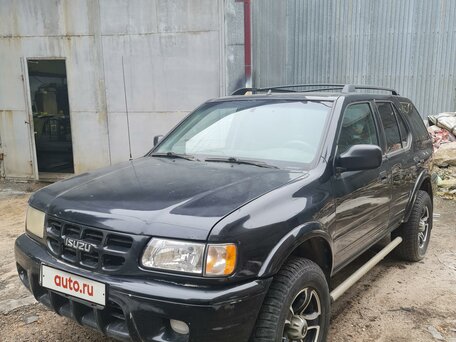 Купить б/у Isuzu Rodeo II 2.2 AT (130 л.с.) бензин автомат в Москве: чёрный  Исузу родео II внедорожник 5-дверный 2001 года на Авто.ру ID 1115364383
