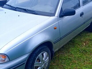 2004 Daewoo Nexia I, серебристый, 210000 рублей, вид 1