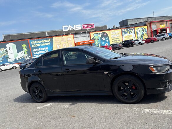 2008 Mitsubishi Lancer X, чёрный, 550000 рублей - вид 6