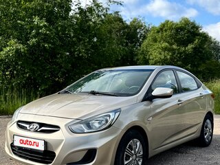 2011 Hyundai Solaris I, бежевый, 690000 рублей, вид 1
