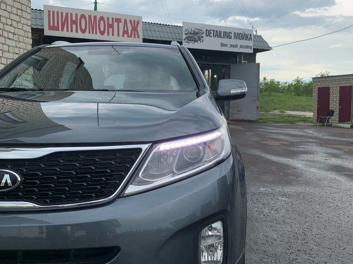 Киа соренто зеленый