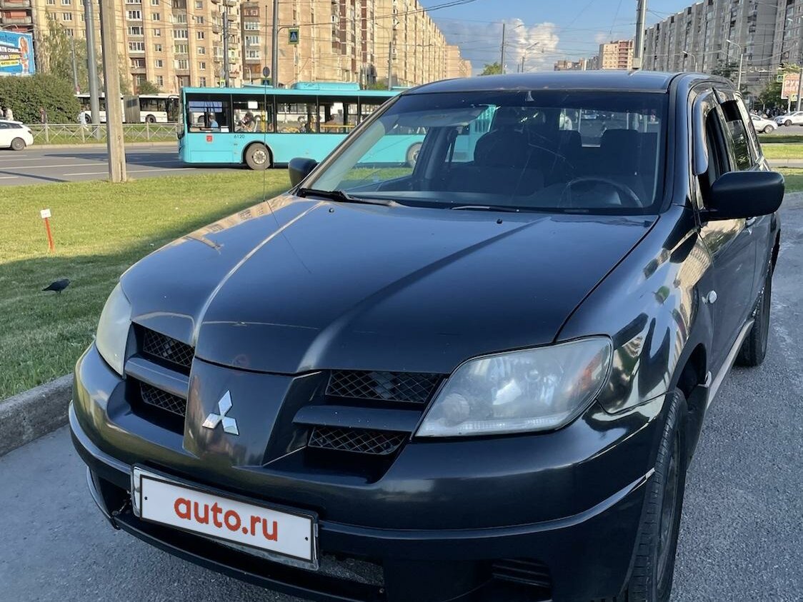 Митсубиси внедорожник черный