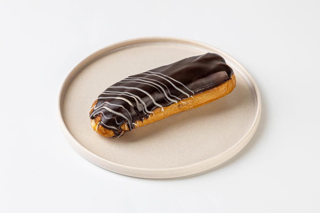 

Эклер с шоколадным заварным кремом кафе, замороженный