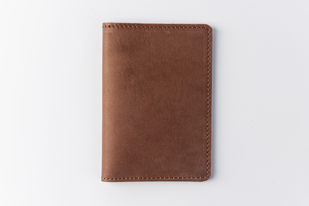 

Обложка для паспорта из натуральной кожи. Цвет: коричневый