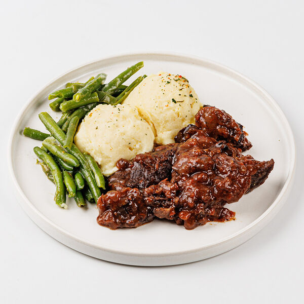 Говядина томленая в гранатовом соке с картофельным пюре и фасолью 250 г