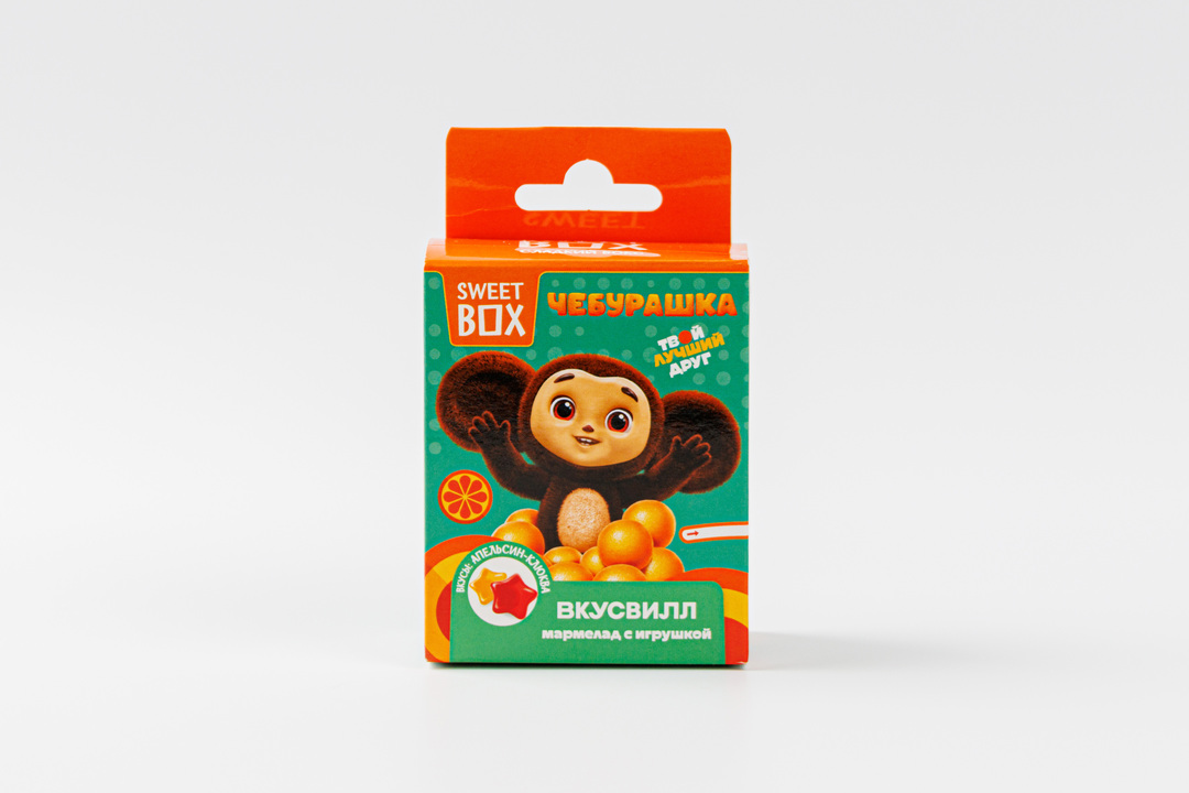 

Сладкий бокс Sweet box Чебуршка апельсин-клюква с игрушкой и мармеладом 10 г