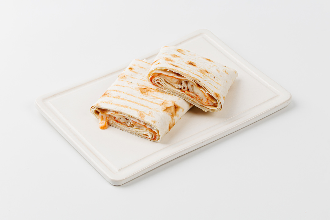 

Сэндвич-гриль ВкусВилл с ветчиной, сыром и томатным соусом в лаваше 140 г