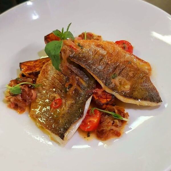 Филе Сибаса с Бататом в Средиземноморском Соусе