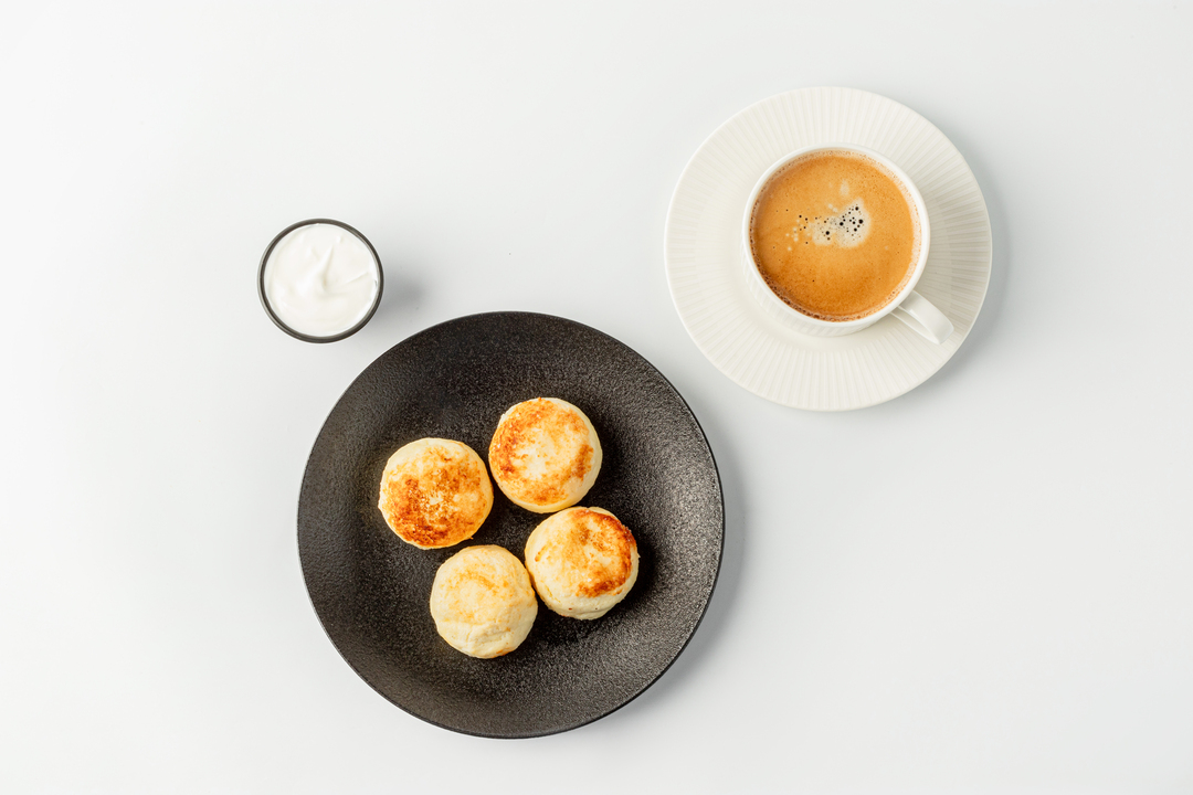 

Комбо на завтрак: Сырники творожные со сметаной + Кофе американо 570 г