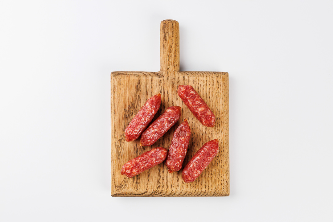 

Колбаски По-испански сырокопченые