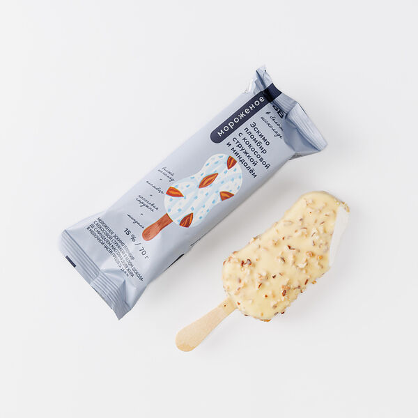 Эскимо пломбир с кокосовой стружкой и миндалем в бел. шок.(Продукт замороженный)