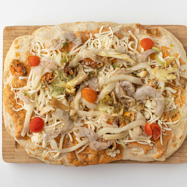 Пицца с морепродуктами и соусом Том ям Продукт замороженный