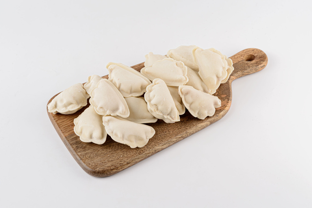 

Вареники ВкусВилл двулепные с клубникой и малиной продукт замороженный 500 г