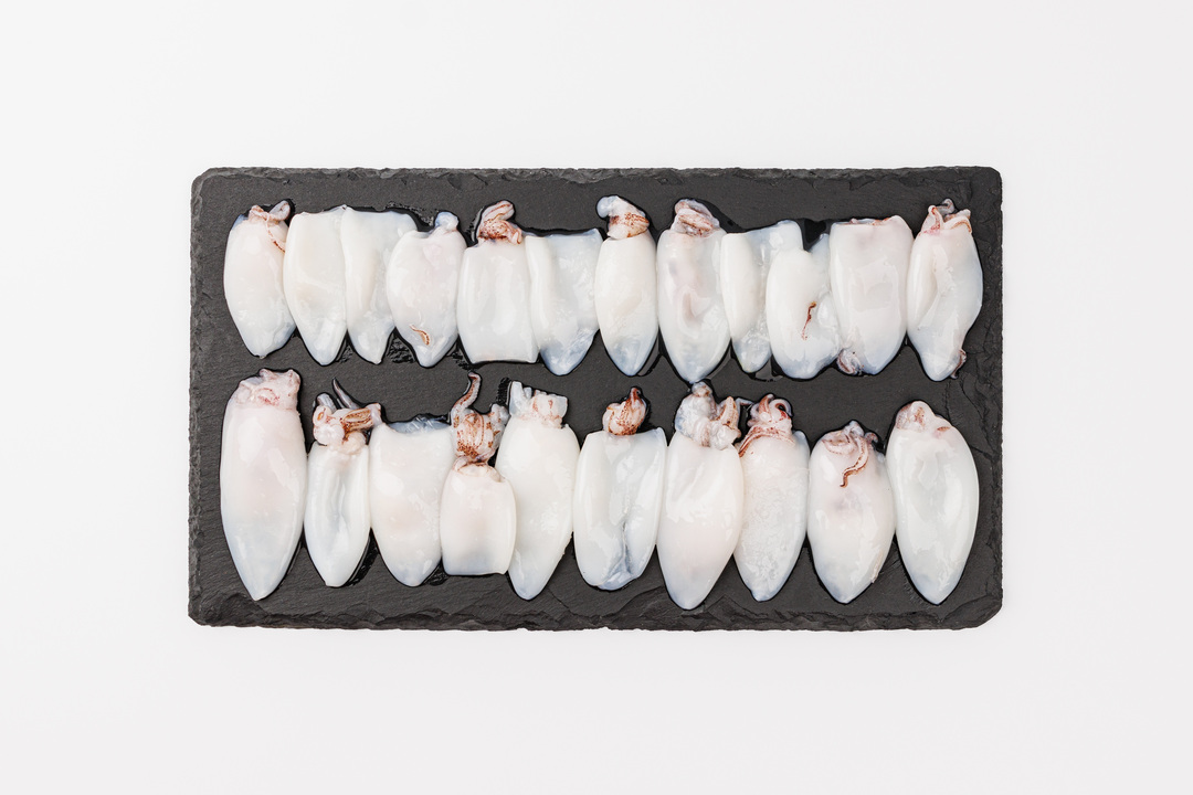 

Кальмар молодой лолиго целый очищенный 40/60 замороженный 400 г