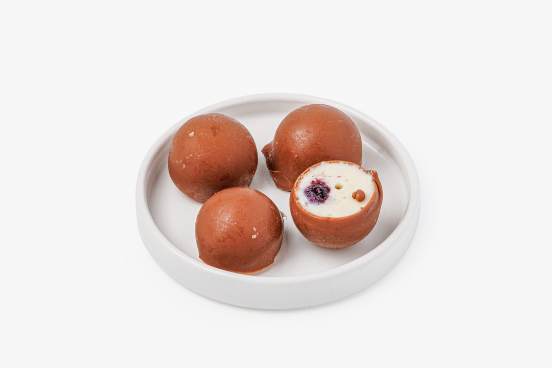 

Мороженое ВкусВилл пломбир Ванильный с голубикой в молочном шоколаде 60 г