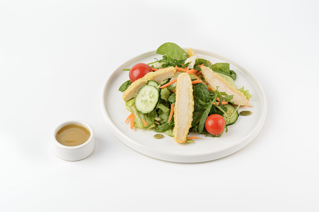 

Салат ВкусВилл с хрустящими кусочками курицы и пикантным соусом 155 г