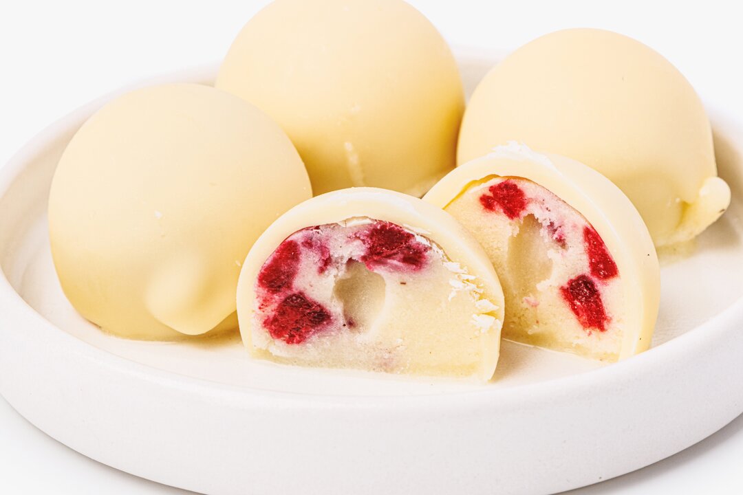 

Мороженое ВкусВилл пломбир Ванильный с малиной в белом шоколаде 60 г