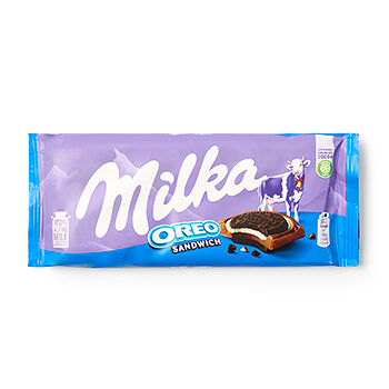 Шоколад молочный Milka с круглым печеньем Oreo с начинкой со вкусом ванили, 92г