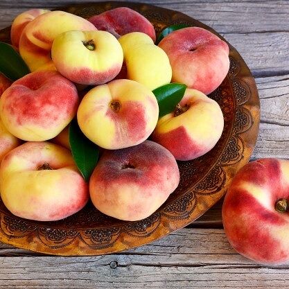 Персики плоские самолетные