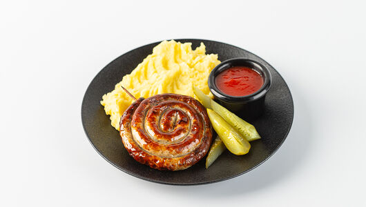 Колбаска Баварская 1 шт. на шпажке с картофельным пюре