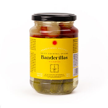 Ассорти овощное Triana Olives чеснок, корнишоны, оливки, перец красный, перец чили