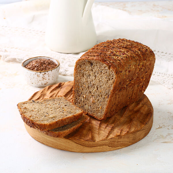 Хлеб зерновой с семенами льна и киноа МясновЪ Пекарня нарезка